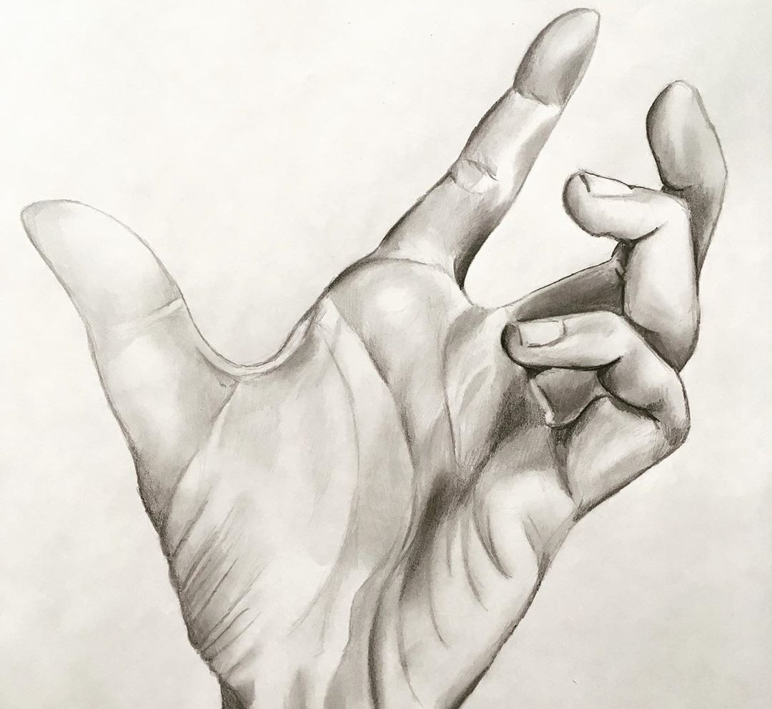 Реалистичная рука карандашом